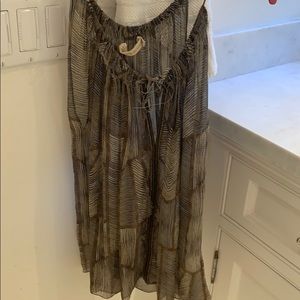 Of two minds green and dark brown tank